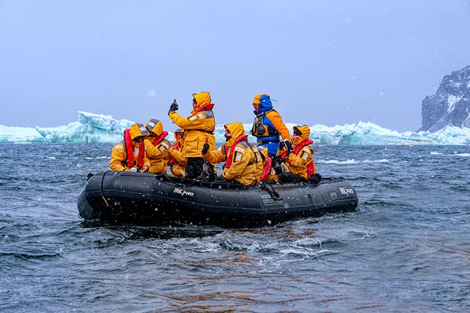Zodiac comes ashore on Paulet Island, Antarctica