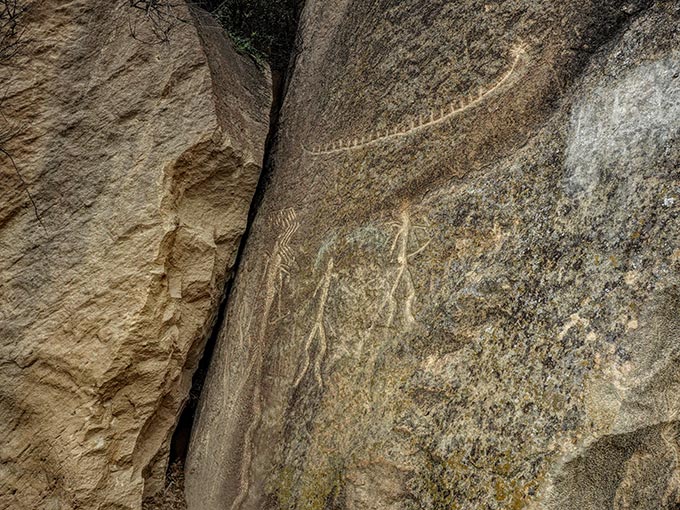 Ancient petroglyphs carved into the rocks at Gobustan National Park