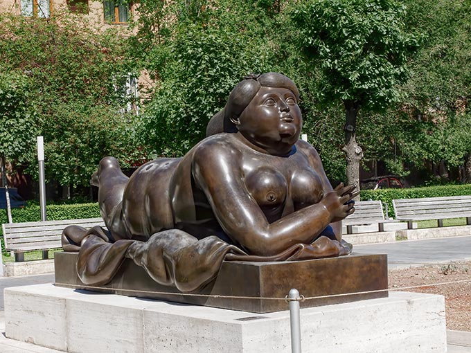 “Woman Smoking a Cigarette,” by Colombian sculptor Fernando Botero Angulo, in the Cafesjian Sculpture Garden in Yerevan