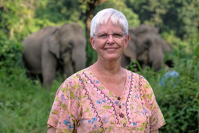 Standing in front of the herd at the Elephant Conservation Center in Lampang, Thailand