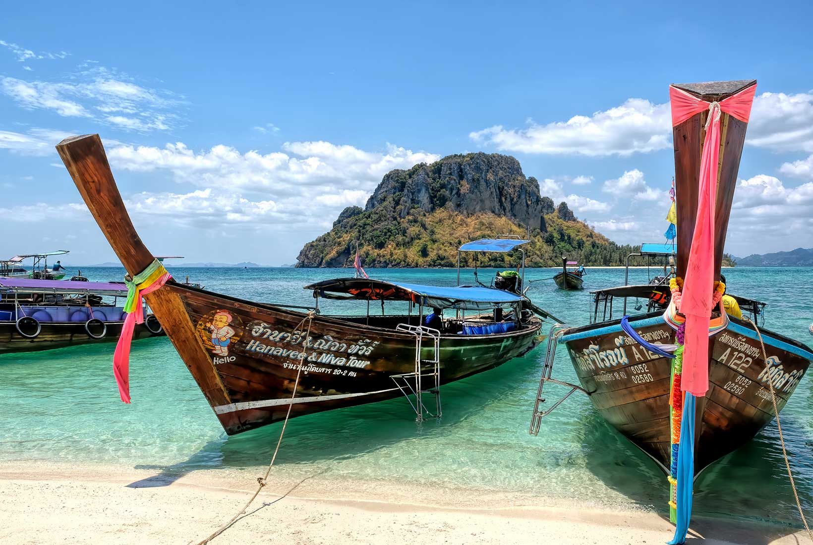 Longtail boats at Koh Tub, a tiny speck of an island in Krabi Province in southern Thailand