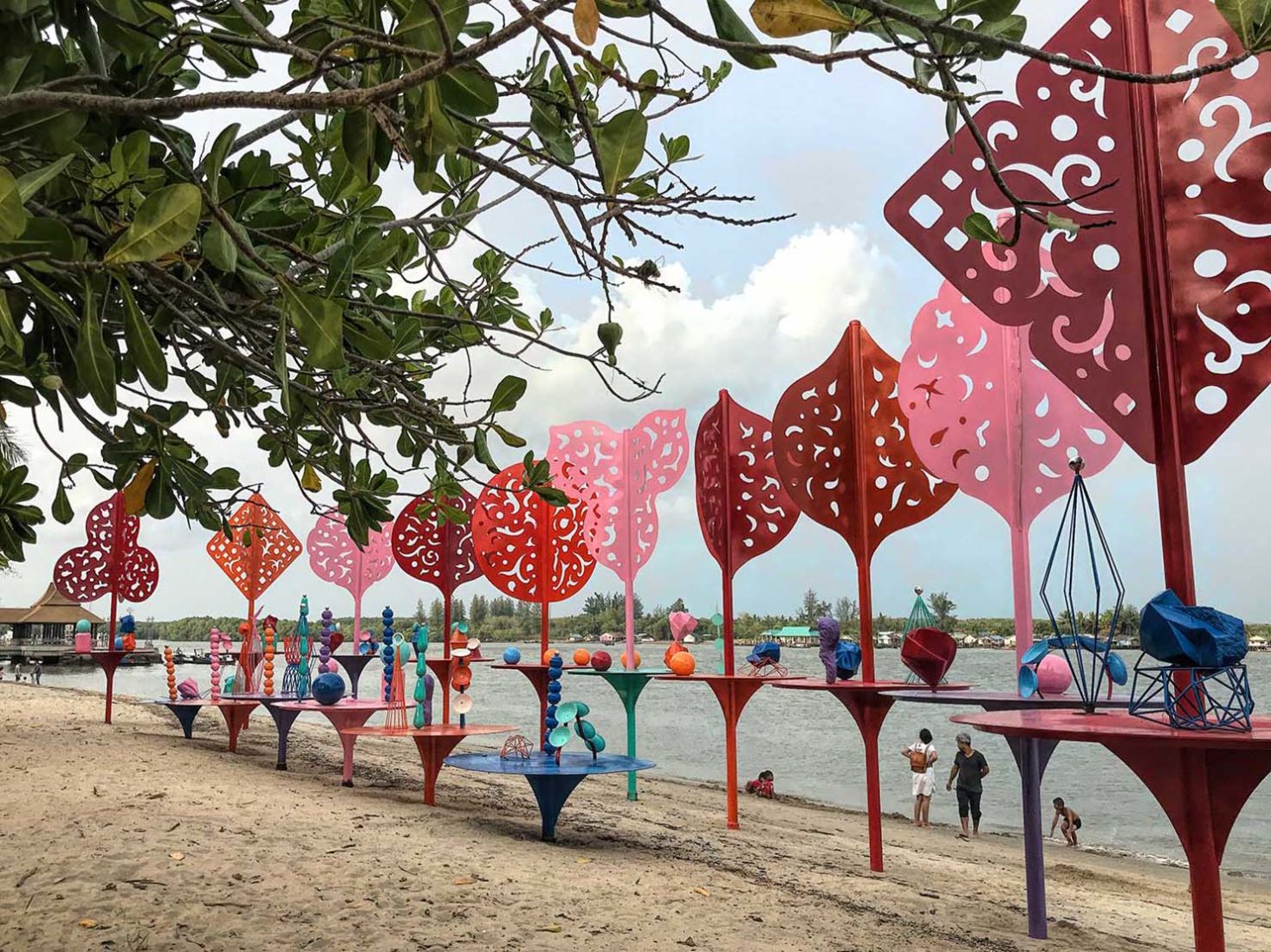 The Story of Love sculpture by Professor Emeritus Vichoke Mukdamanee on the riverfront at Thara Park in Krabi Town