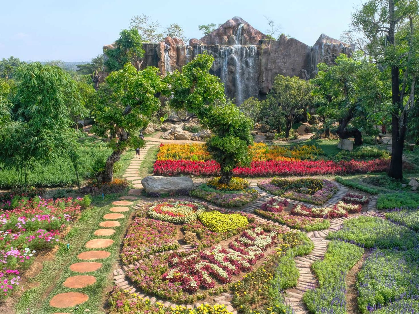 Formal gardens in frt of the main Waterfall mountain at Dantewada Land of Angels Waterfall Park