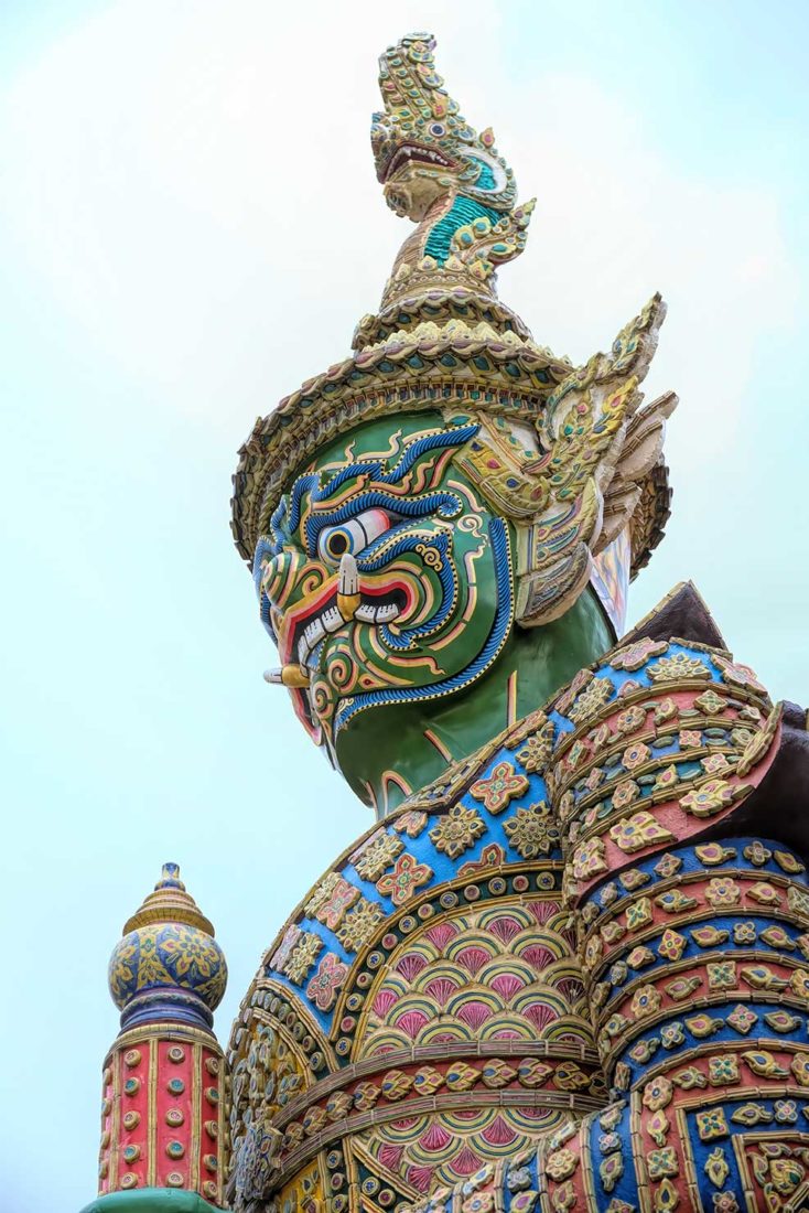 One of the giant demon guardian statues at the Grand Palace in Bangkok Thailand