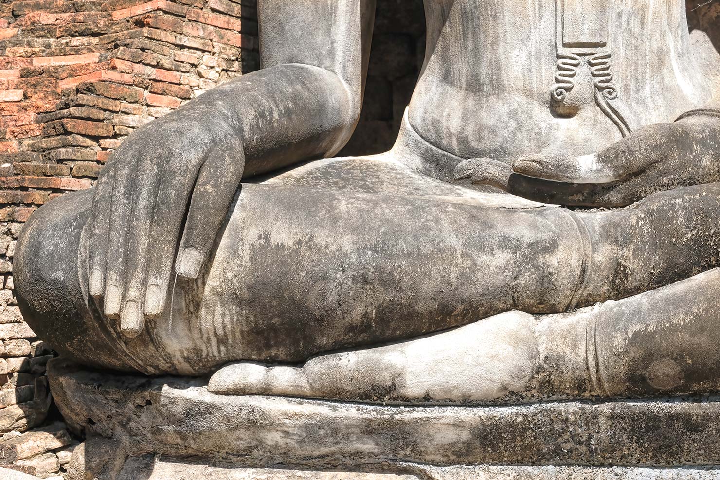 Thailand Sukhothai Historical Park Central Zone Wat Mahathat Buddha icon closeup