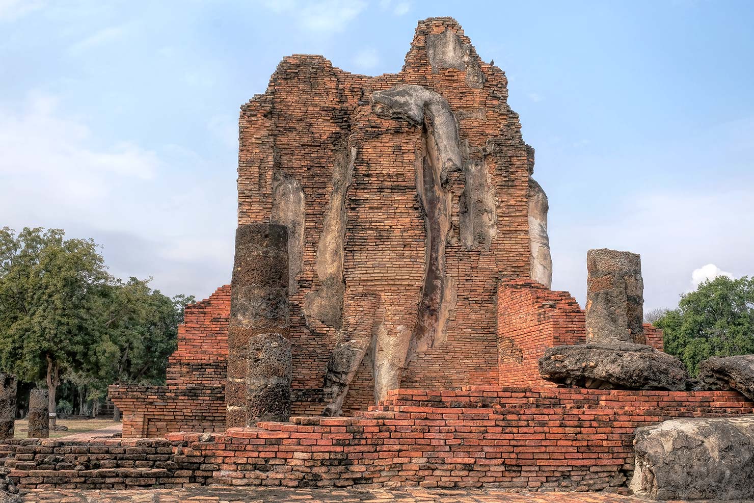 Thailand Sukhothai Historical Park Northern Zone Wat Phra Phai Luang with rare standing striding budda sculpture