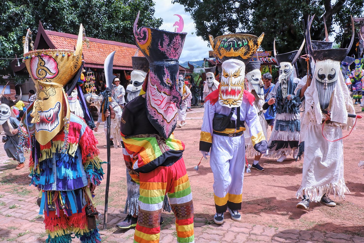 Costumed participants at Wat Phon Chai in Dan Sai