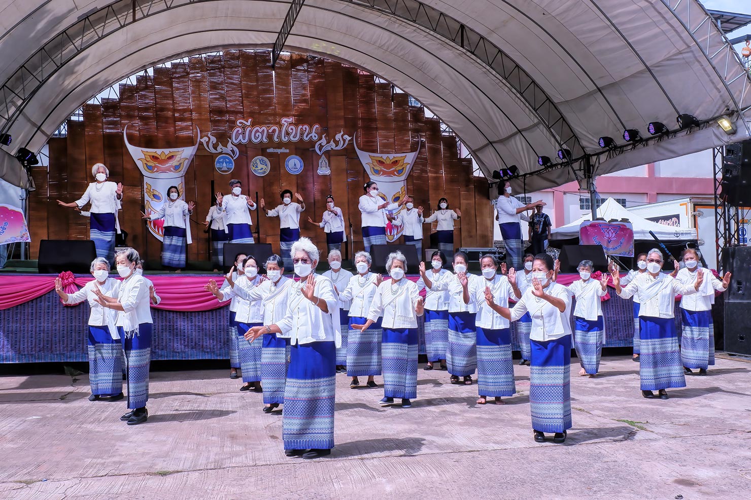 Traditional dance troupe performs at Wat Phon Chai in Loei Province