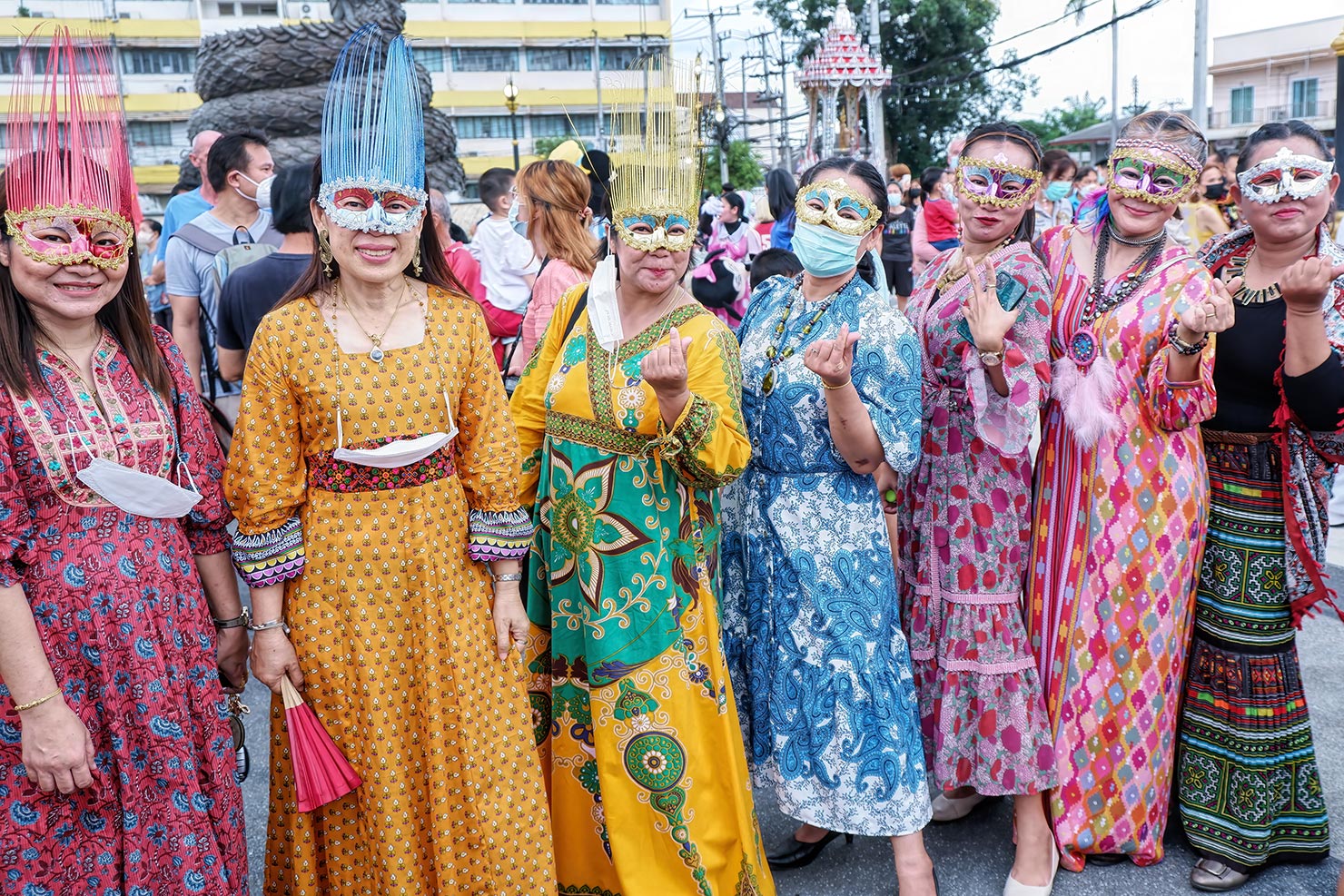 Women gather in the central square of Loei gather for the opening ceremony of the Phi ta Khon Festival