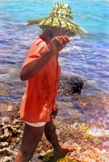 I didn't know why I travel when I was young, I just knew I loved it. Man walks the reef in Montego Bay, Jamaica