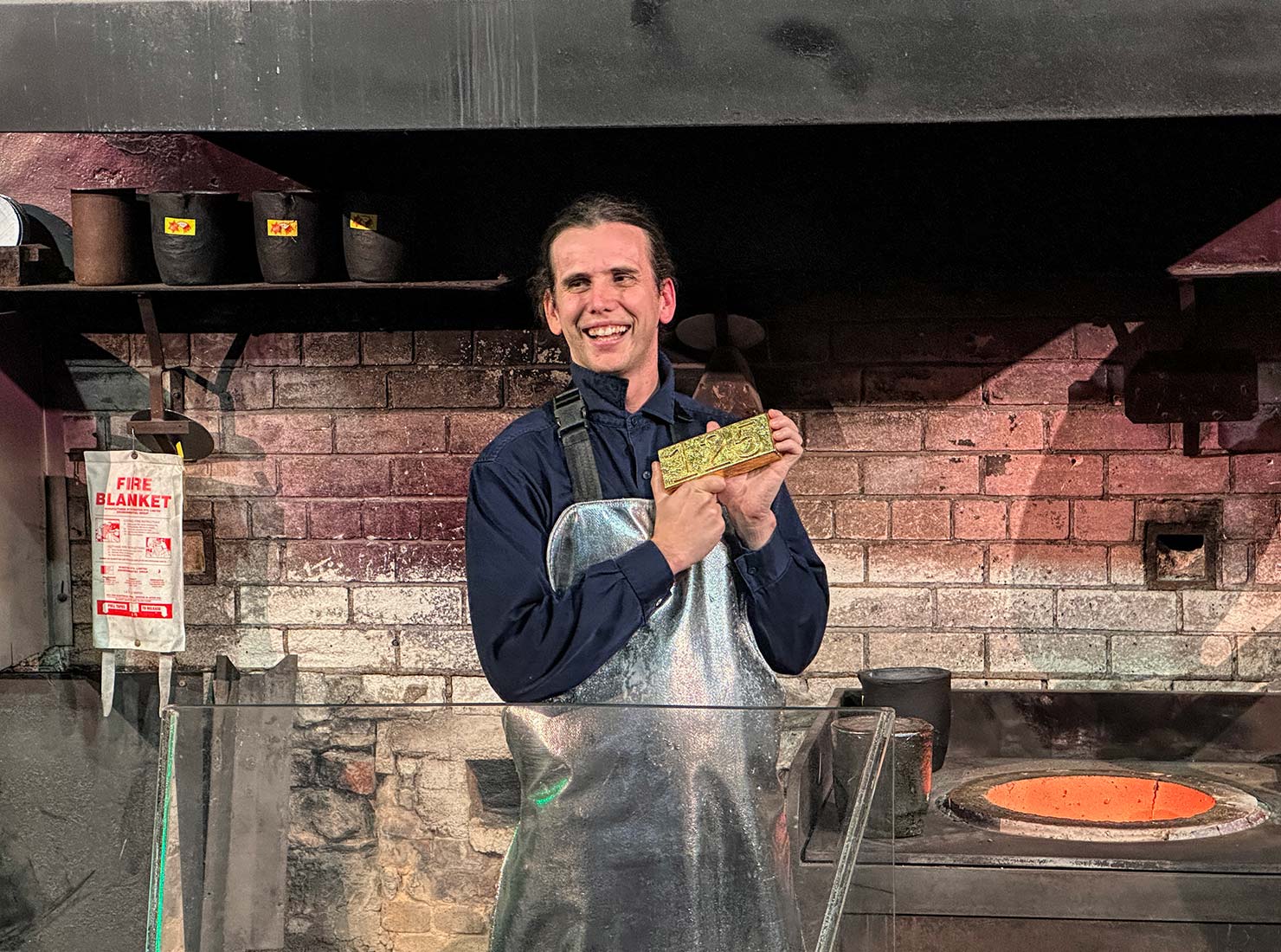 Pouring a 99.99 percent pure gold bar at the Perth Mint Australia