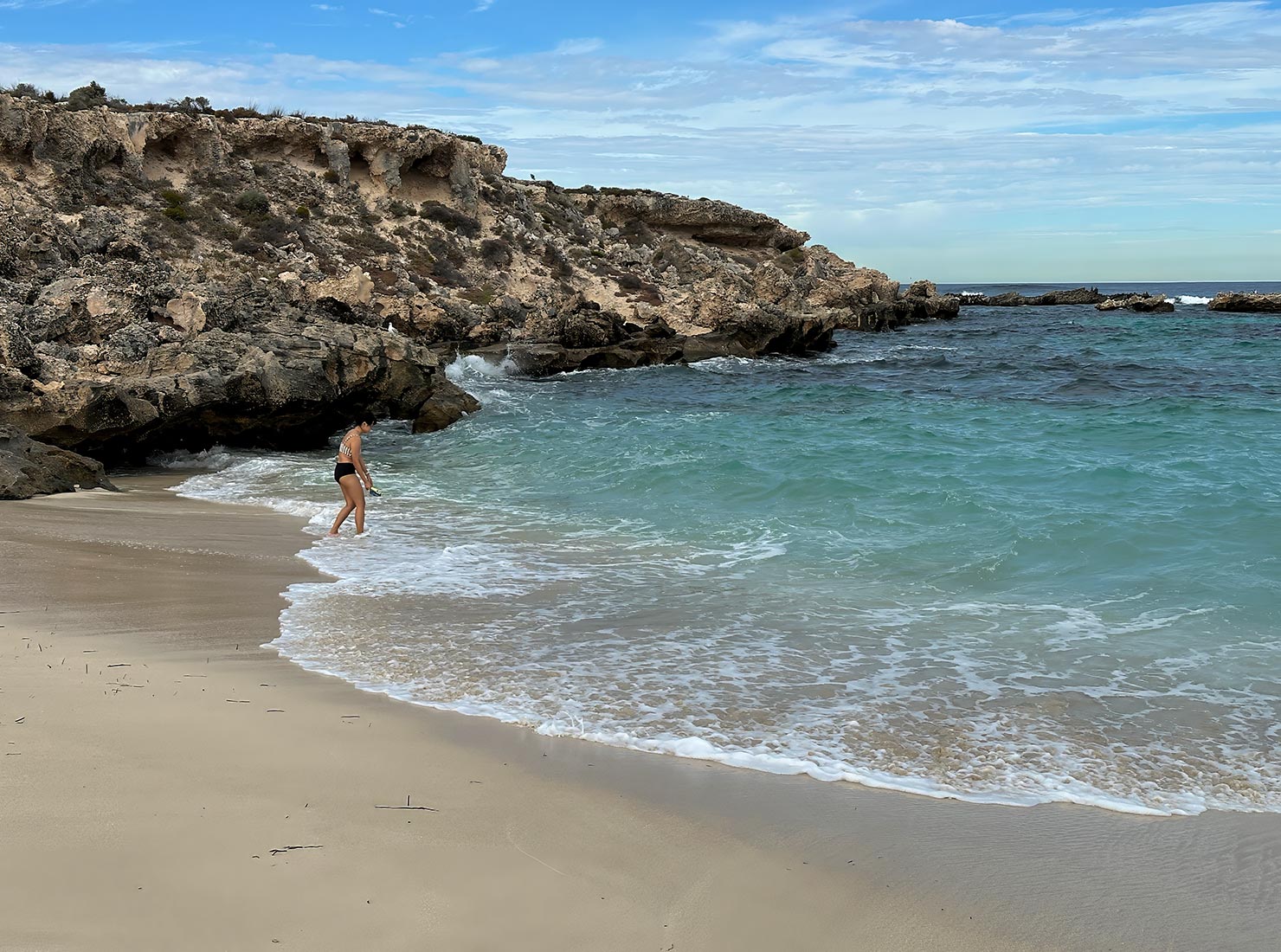 The water is chilly, but swimming is allowed at any of the many gorgeous coves scattered around the island