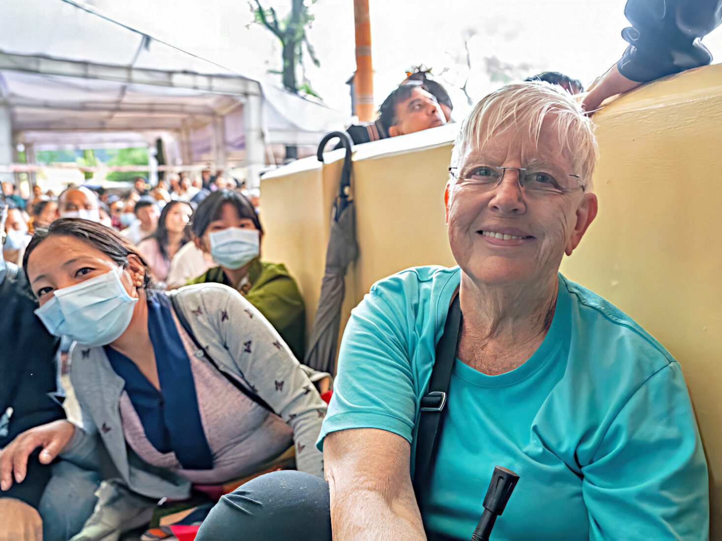 India McLeod Ganj Namgyal Monastery Barbara Weibel at Long Life Ceremony during Dalai Lama's 90th birthday celebration photo courtesy of Tsungyi Chiu