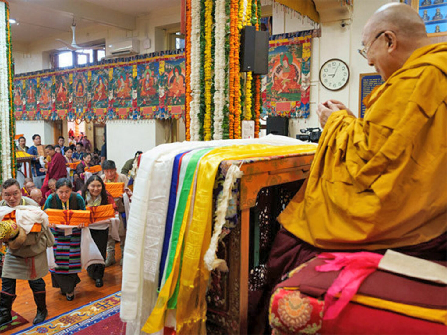 India McLeod Ganj Namgyal Monastery Tibetans offer gifts at Long Life Ceremony during Dalai Lama's 90th birthday celebration courtesy of the Office of His Holiness the Dalai Lama