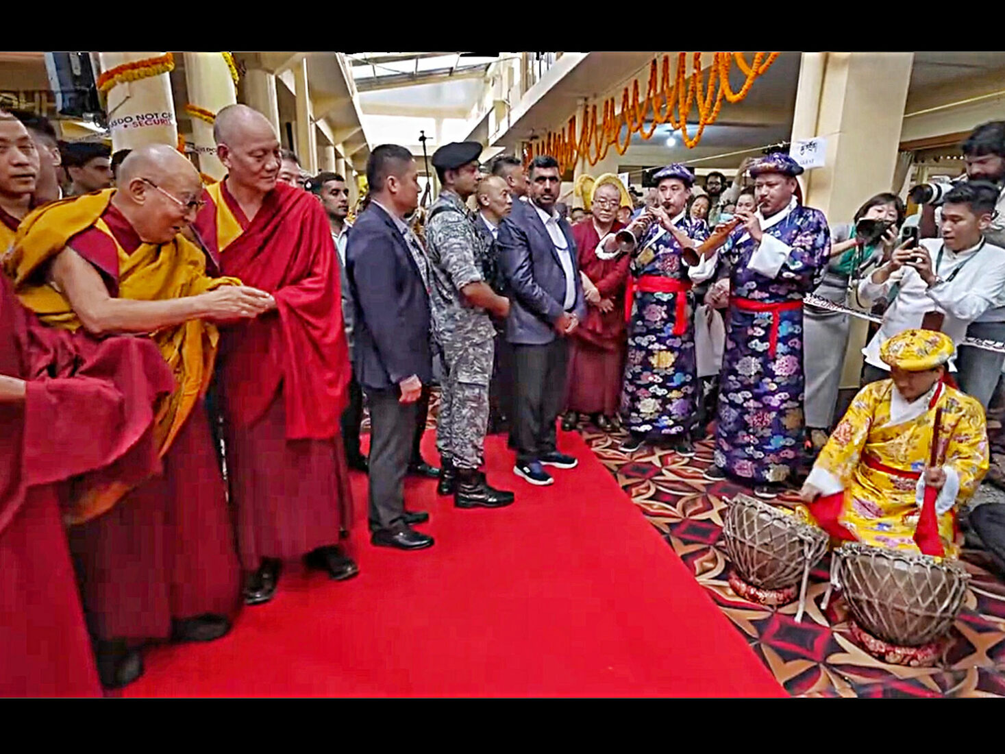 India McLeod Ganj Namgyal Monastery Dalai Lama Temple Dalai Lama listens to Tibetan musicians at Long Life Ceremony courtesy of the Office of His Holiness the Dalai Lama