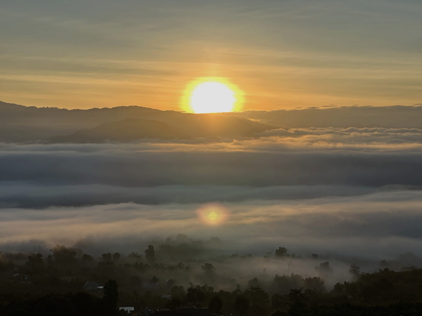 Sunrise at Yun Lai Viewpoint offers visitors the opportunity to view the Talay Morg (sea of fog) rise out of the valley as the air warms up revealing the city of Pai Thailand